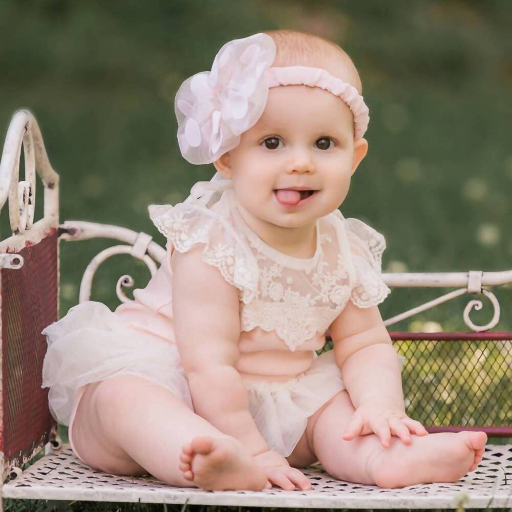 NEW MAE LI ROSE baby girls' lacey neckline onesie in peach